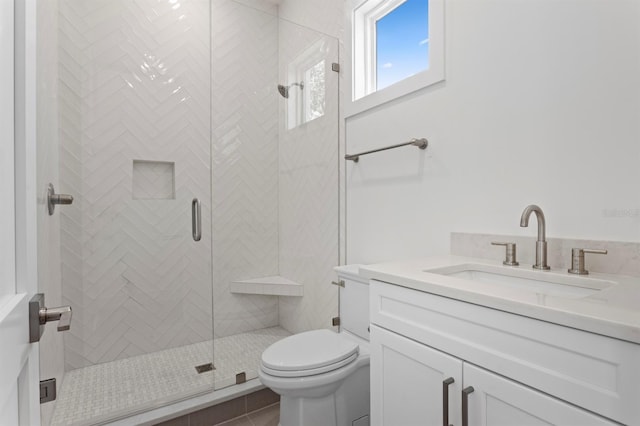 3406 W Alline Ave, Tampa, FL 33611 - bathroom with vanity, toilet, a stall shower, and tile patterned flooring