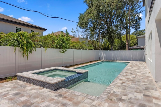 3406 W Alline Ave, Tampa, FL 33611 - view of pool with a fenced backyard, a pool with connected hot tub, and a patio