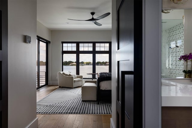 interior space featuring hardwood / wood-style floors and a water view