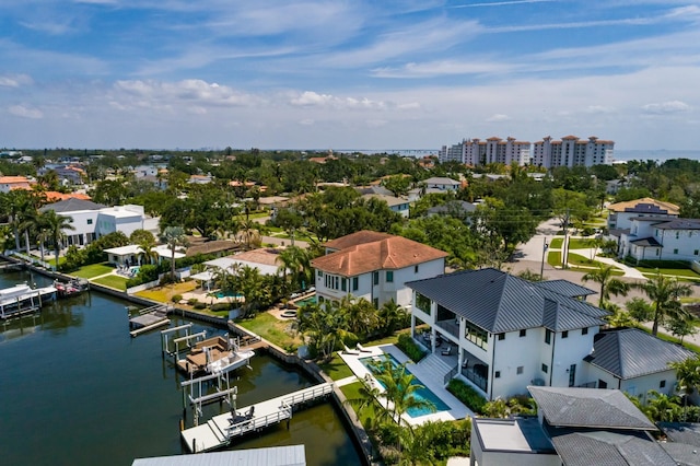 aerial view with a residential view and a water view