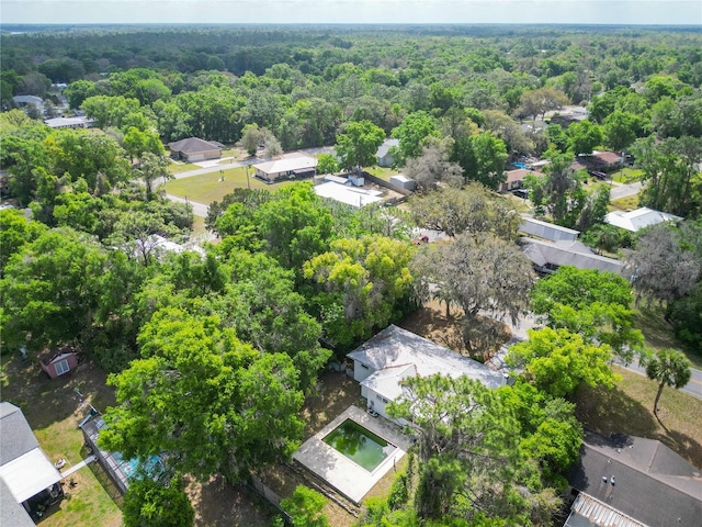 aerial view featuring a view of trees