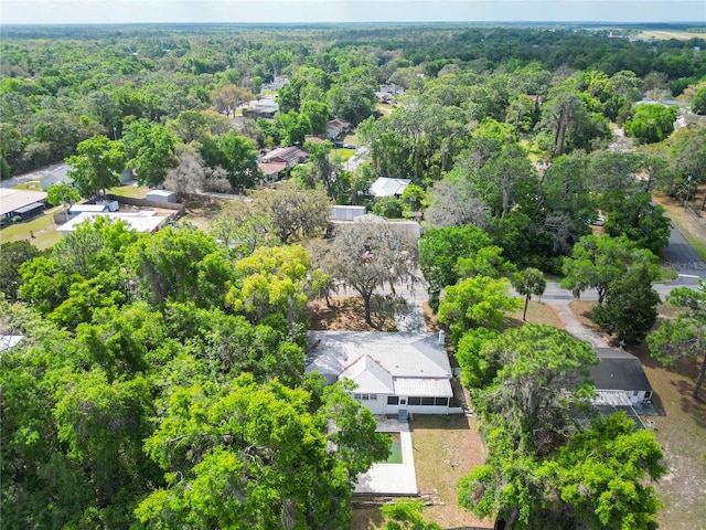 bird's eye view featuring a forest view