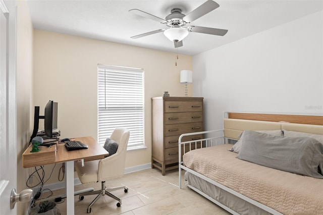 tiled bedroom with ceiling fan