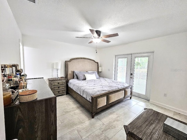 bedroom with a ceiling fan, access to outside, french doors, and a textured ceiling