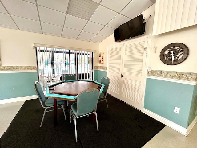 1423 Pine Glen Ln Unit D2, Tarpon Springs, FL 34688 - dining room featuring baseboards