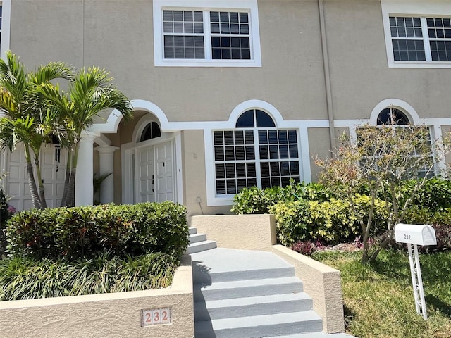 232 Columbia Dr, Tampa, FL 33606 - property entrance with stucco siding