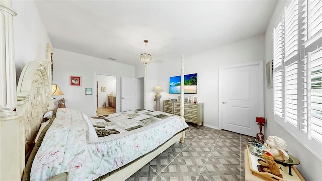 bedroom with multiple windows and visible vents