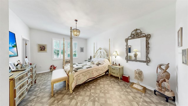 bedroom featuring baseboards