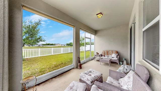 sunroom / solarium with an outdoor hangout area