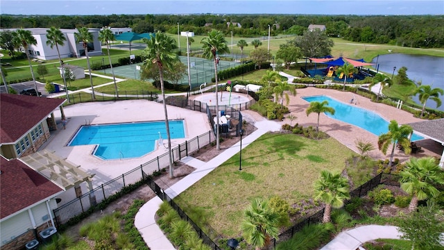 birds eye view of property featuring a water view