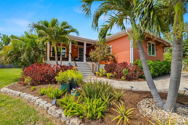 2623 57th St S, Gulfport, FL 33707 - view of front of property featuring covered porch and stairs