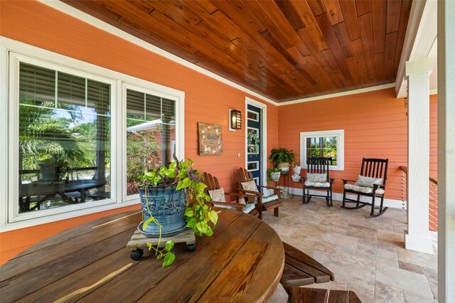 2623 57th St S, Gulfport, FL 33707 - view of patio / terrace featuring a porch
