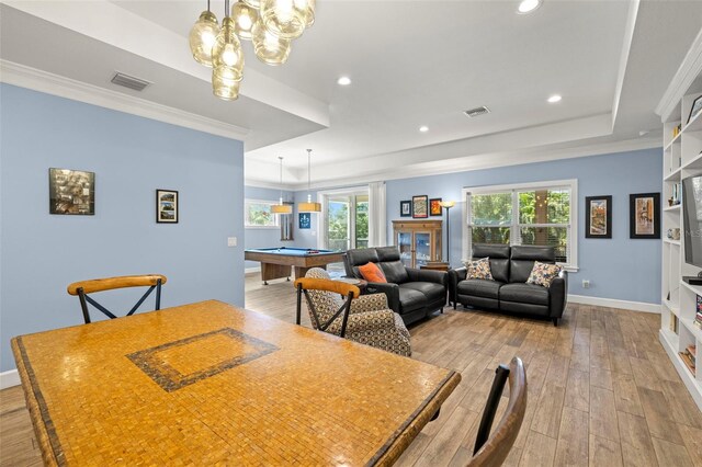 2623 57th St S, Gulfport, FL 33707 - dining space with visible vents, billiards, a raised ceiling, and wood finished floors
