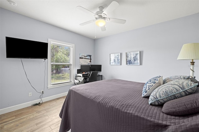 2623 57th St S, Gulfport, FL 33707 - bedroom featuring light wood-style flooring, ceiling fan, and baseboards