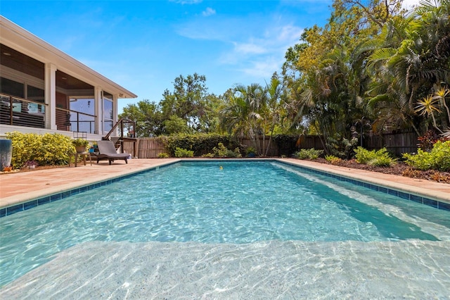 2623 57th St S, Gulfport, FL 33707 - view of swimming pool with a fenced in pool, a patio area, and a fenced backyard