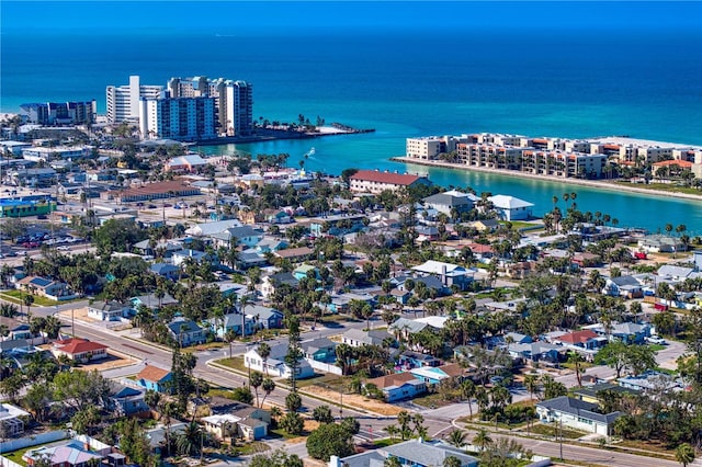 birds eye view of property featuring a water view and a view of city