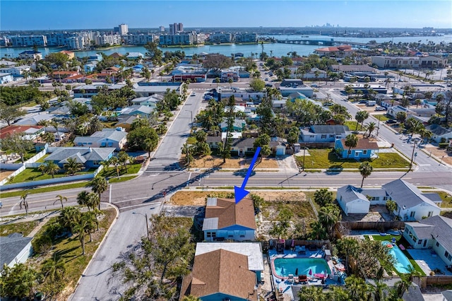 bird's eye view with a water view