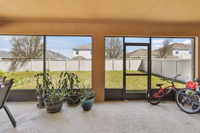 sunroom featuring a wealth of natural light