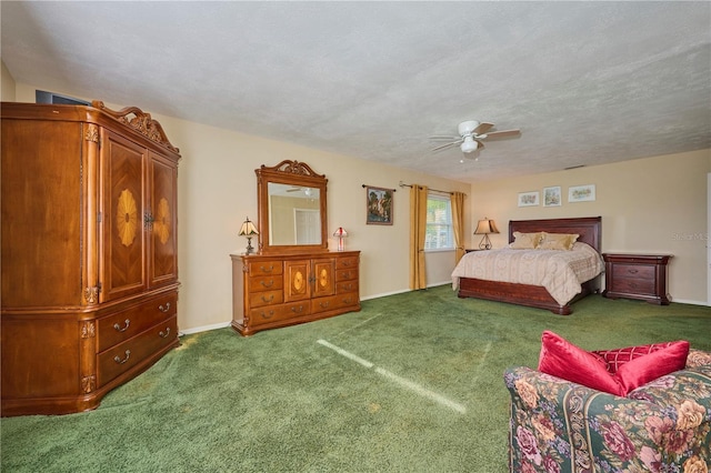6589 Banyan Dr, Indian Lake Estates, FL 33855 - carpeted bedroom with a textured ceiling, baseboards, and a ceiling fan