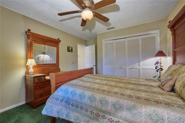 6589 Banyan Dr, Indian Lake Estates, FL 33855 - bedroom with carpet, a closet, a ceiling fan, visible vents, and baseboards