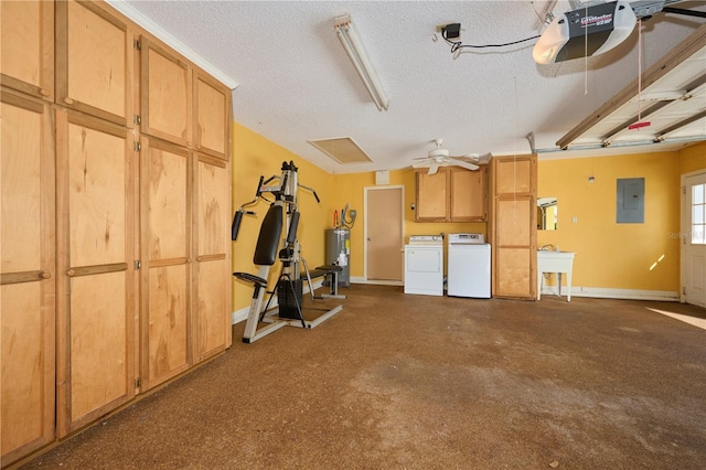 6589 Banyan Dr, Indian Lake Estates, FL 33855 - garage with electric panel, water heater, a garage door opener, baseboards, and washer and clothes dryer