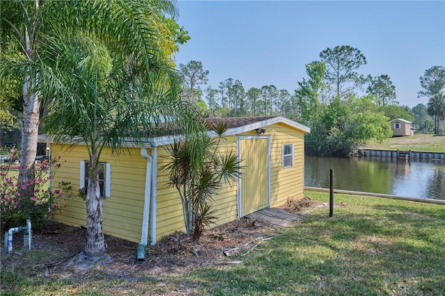 6589 Banyan Dr, Indian Lake Estates, FL 33855 - view of outdoor structure featuring a water view and an outdoor structure