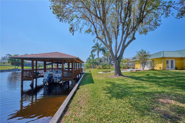 6589 Banyan Dr, Indian Lake Estates, FL 33855 - dock area with a water view and a yard