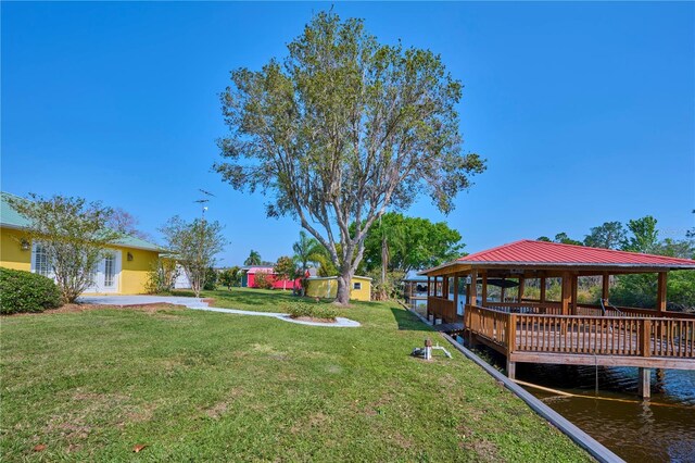 6589 Banyan Dr, Indian Lake Estates, FL 33855 - view of yard with a water view and a gazebo