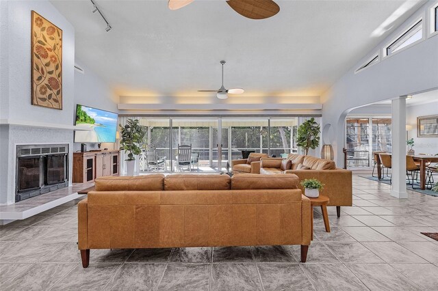 5430 Avenida Del Mare, Sarasota, FL 34242 - living room featuring ceiling fan, lofted ceiling, plenty of natural light, and arched walkways