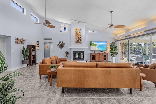 5430 Avenida Del Mare, Sarasota, FL 34242 - living area with ceiling fan, healthy amount of natural light, track lighting, and high vaulted ceiling