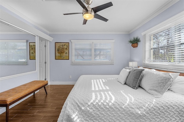 5430 Avenida Del Mare, Sarasota, FL 34242 - bedroom featuring crown molding, multiple windows, dark wood-style floors, and ceiling fan