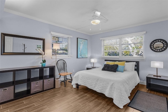 5430 Avenida Del Mare, Sarasota, FL 34242 - bedroom with multiple windows, crown molding, wood finished floors, and a ceiling fan