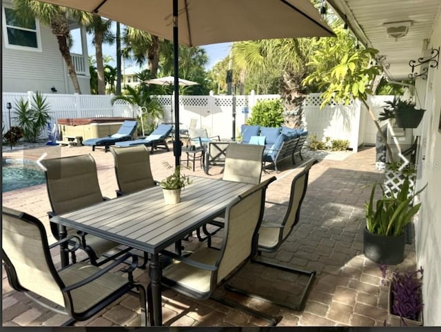 5430 Avenida Del Mare, Sarasota, FL 34242 - fenced backyard with outdoor dining space, a patio area, an outdoor living space, and a pool