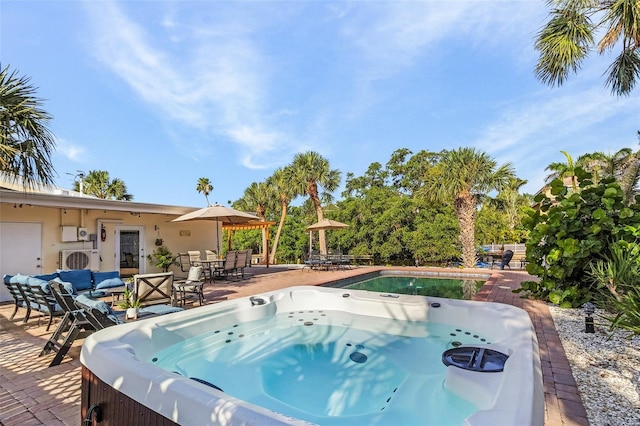 5430 Avenida Del Mare, Sarasota, FL 34242 - view of pool with a hot tub, a patio area, and outdoor dining space