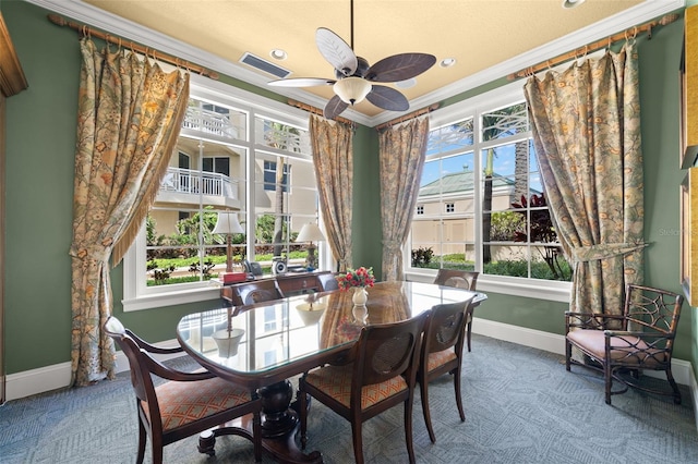 dining space featuring baseboards, ornamental molding, carpet, ceiling fan, and recessed lighting