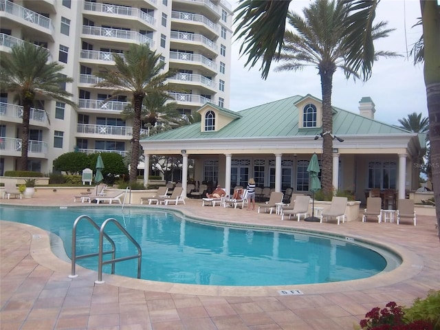 community pool with a patio