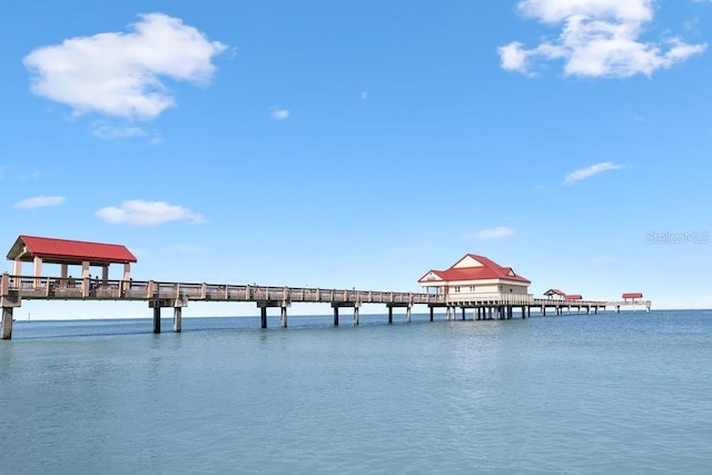 dock featuring a pier and a water view