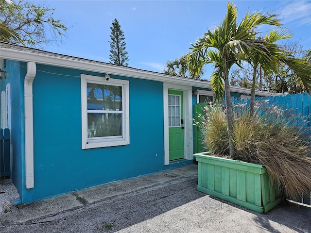 property entrance featuring fence