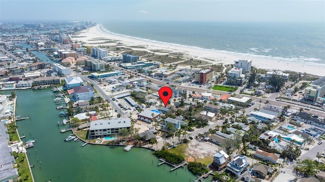 aerial view featuring a water view and a beach view