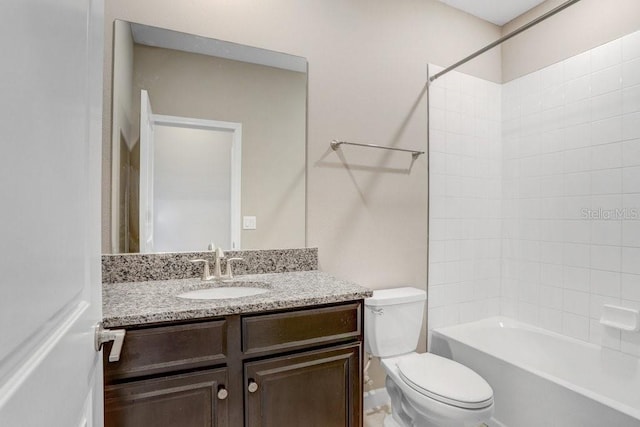 full bath with shower / bathing tub combination, toilet, and vanity
