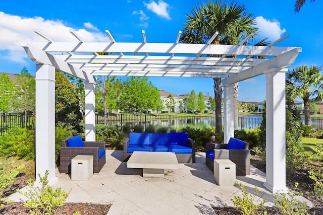view of patio with a fenced backyard, a water view, an outdoor living space, and a pergola