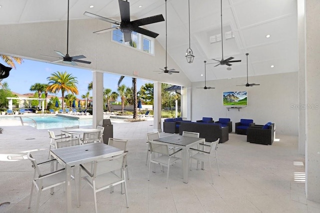 view of patio / terrace with an outdoor living space, outdoor dining area, and an outdoor pool