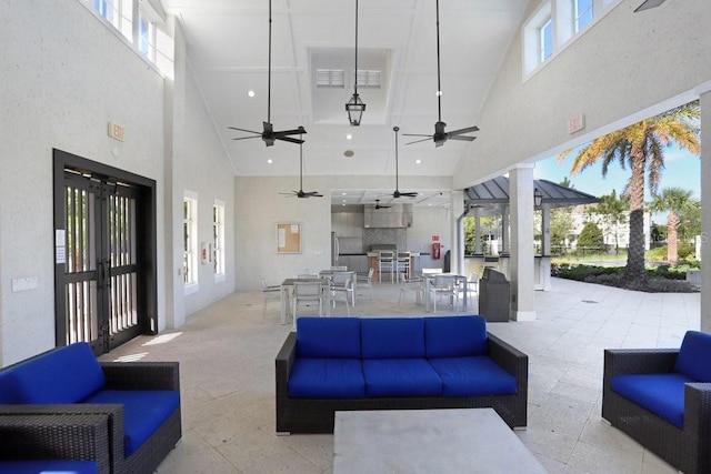 view of patio / terrace with outdoor lounge area, ceiling fan, and outdoor dining space