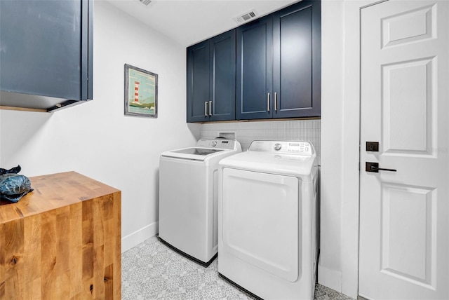 laundry area featuring cabinet space, visible vents, baseboards, and separate washer and dryer