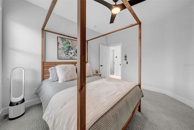 carpeted bedroom featuring baseboards and ceiling fan