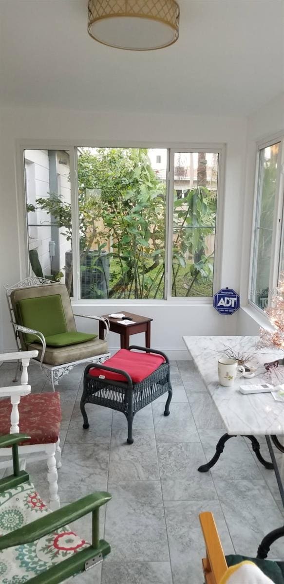 3919 Harrisburg St NE, Saint Petersburg, FL 33703 - sunroom / solarium featuring a healthy amount of sunlight