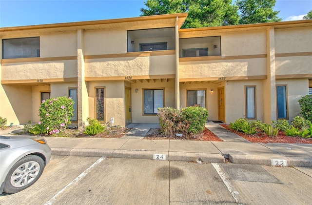 1424 Highland Ridge Cir, Brandon, FL 33510 - view of property featuring uncovered parking