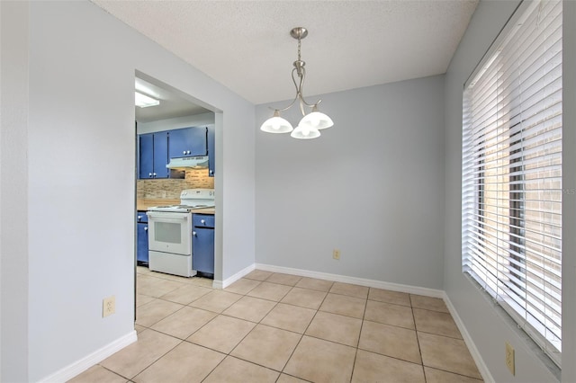 1424 Highland Ridge Cir, Brandon, FL 33510 - unfurnished dining area with a chandelier, a textured ceiling, light tile patterned flooring, and a wealth of natural light