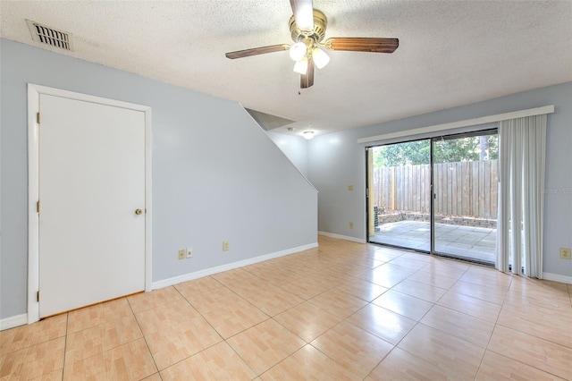 1424 Highland Ridge Cir, Brandon, FL 33510 - spare room with visible vents, a textured ceiling, baseboards, and ceiling fan