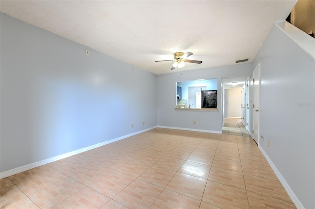 1424 Highland Ridge Cir, Brandon, FL 33510 - empty room featuring visible vents, baseboards, light tile patterned flooring, and ceiling fan